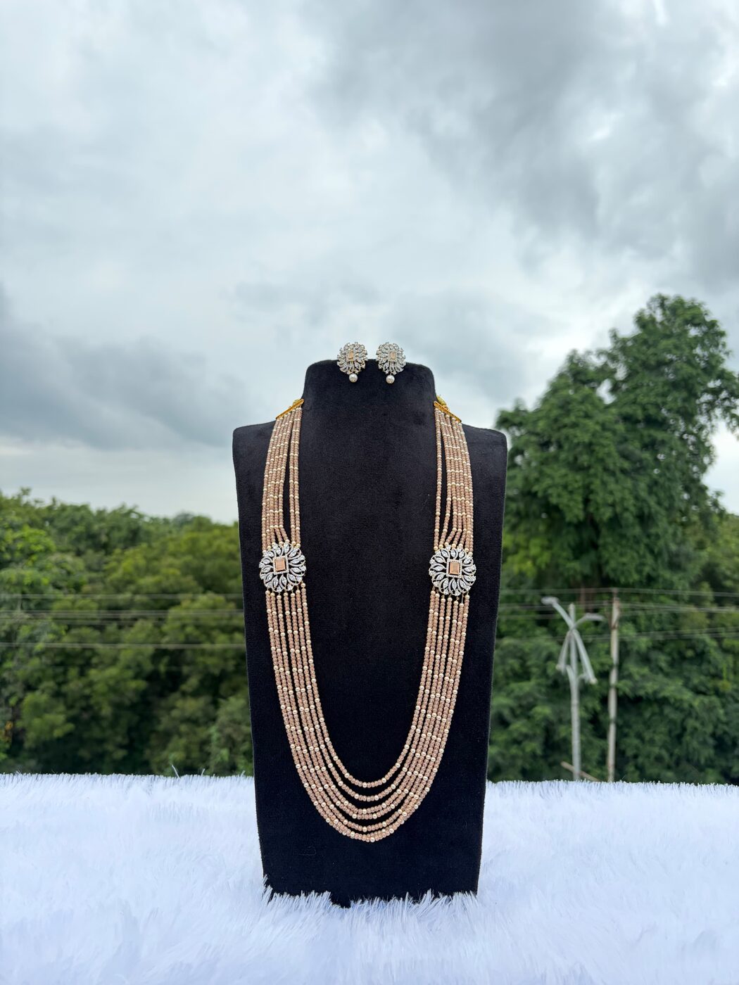 7 Layered Lite Peach Real CZ along with Swarovski Pearls
