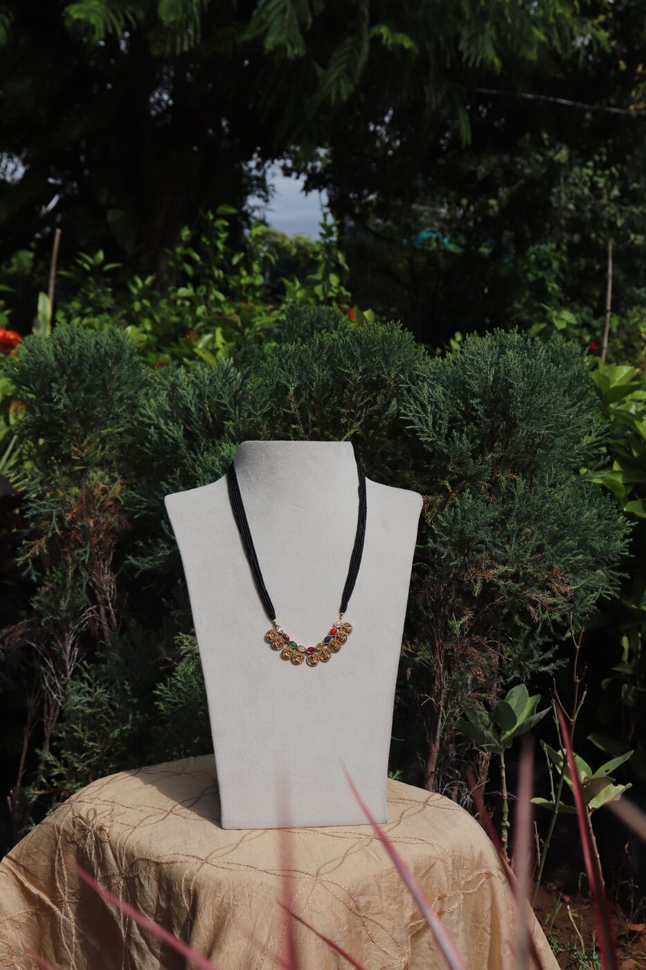 Navaratna Pendant with Black Beads